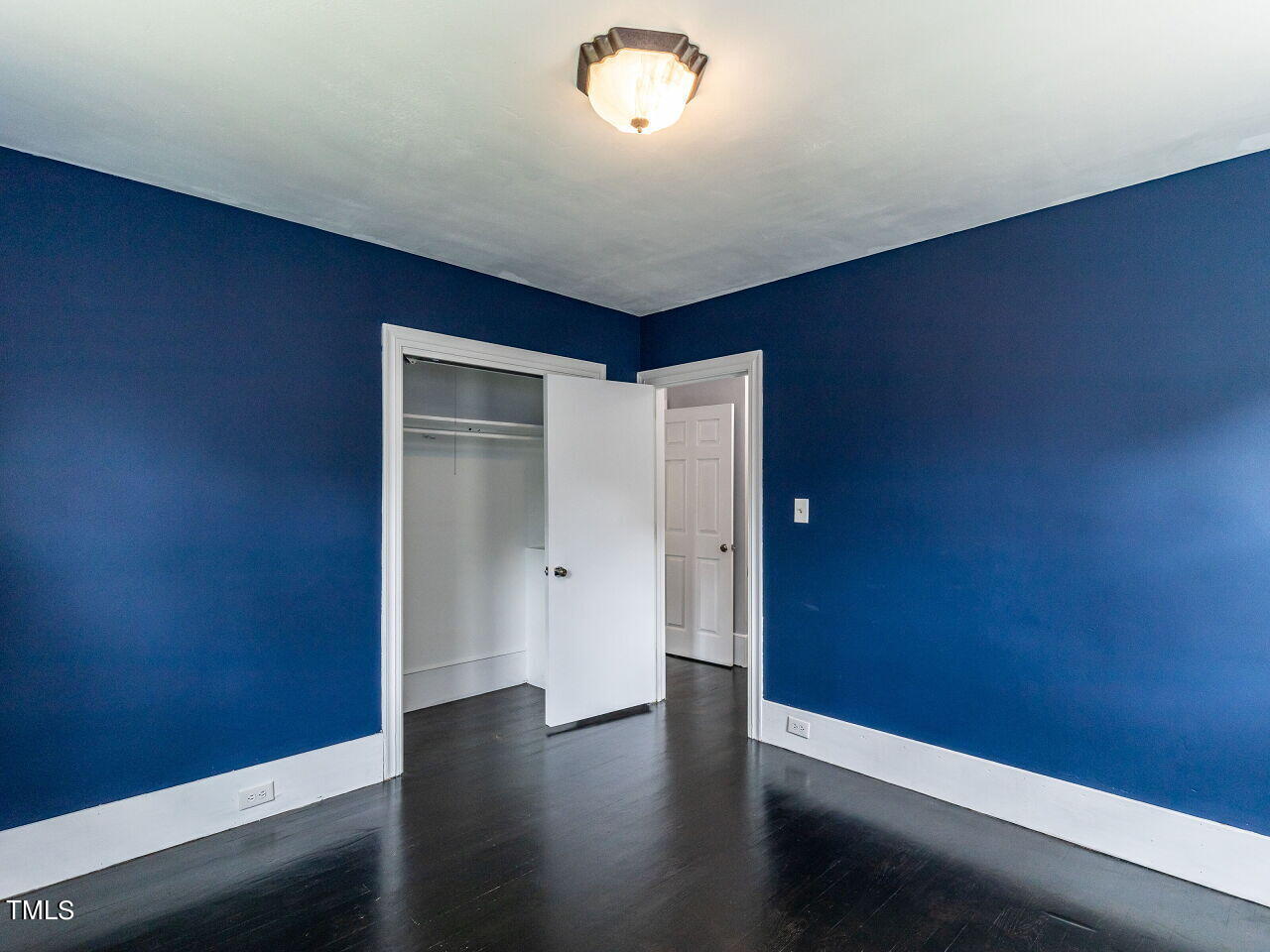 7 Ratcale Lane Durham, NC 27705 - Photo 11 of 33 a view of empty room with wooden floor