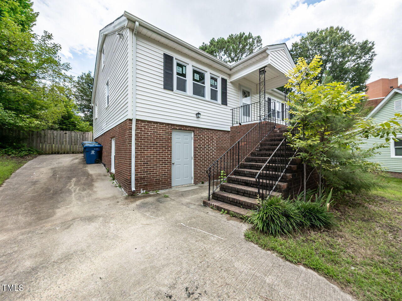 7 Ratcale Lane Durham, NC 27705 - Photo 19 of 33 a view of a house with a yard