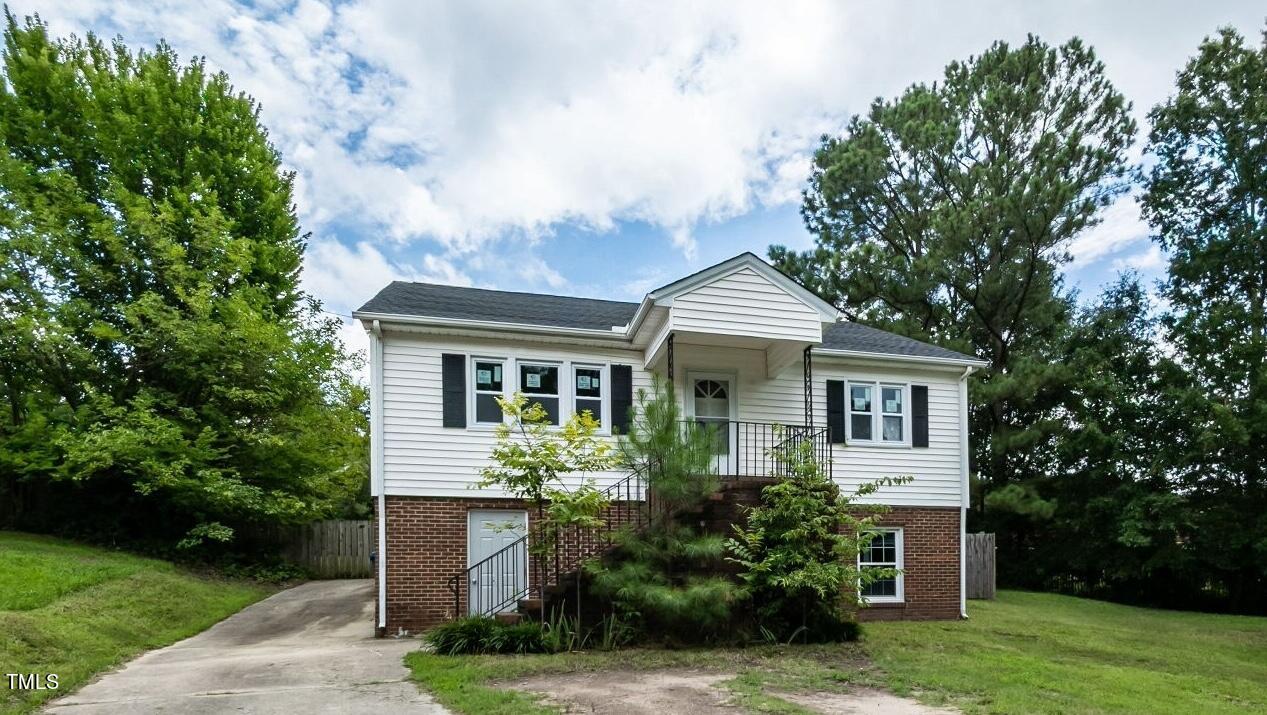 7 Ratcale Lane Durham, NC 27705 - Photo 2 of 33 a front view of house with a garden