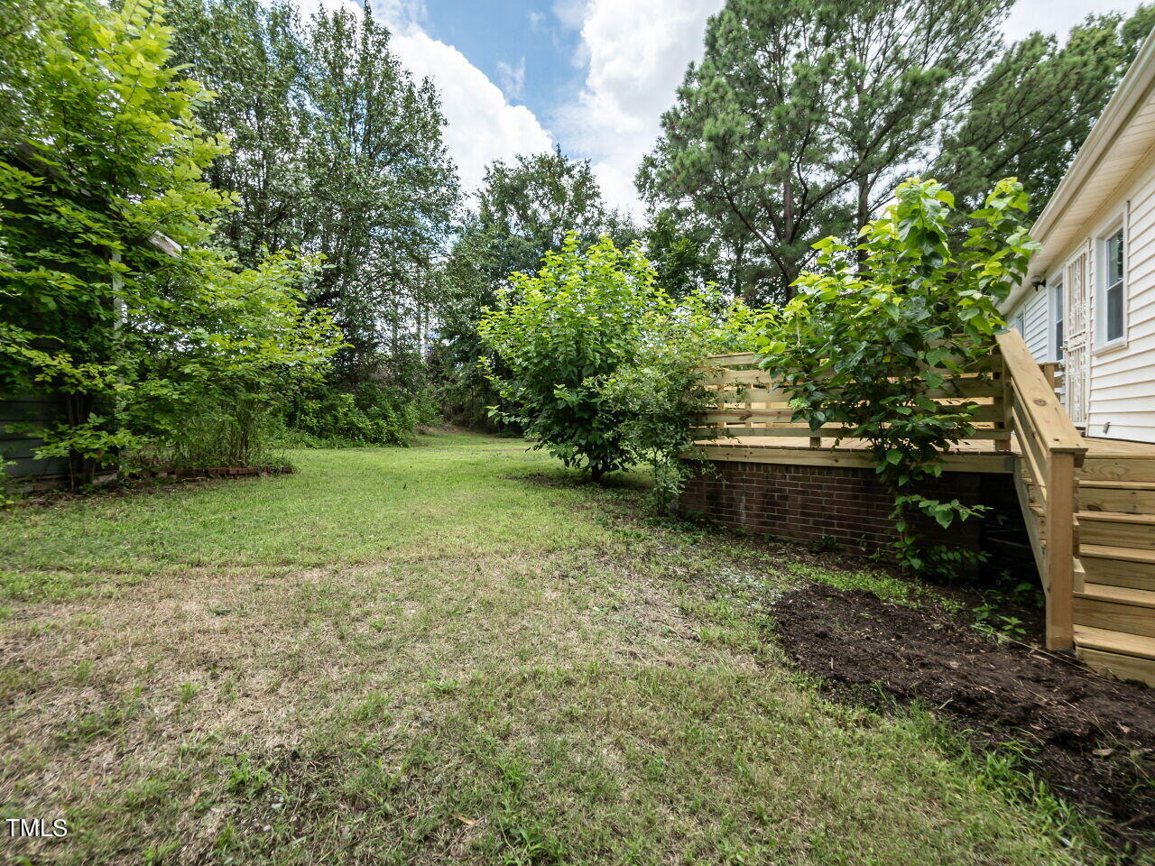 7 Ratcale Lane Durham, NC 27705 - Photo 32 of 33 a view of backyard with green space