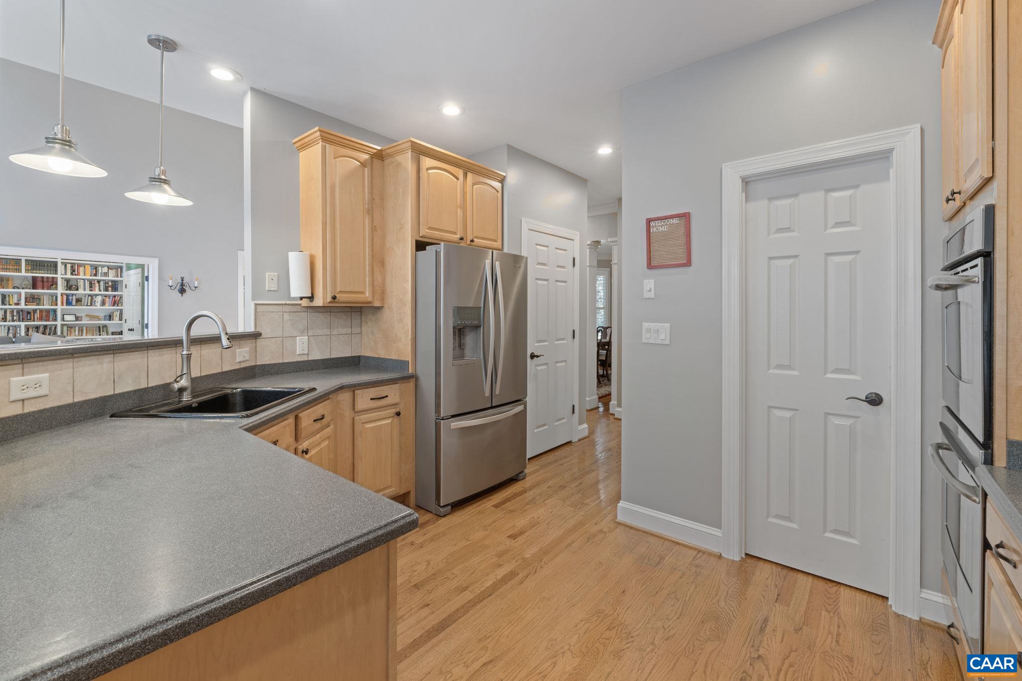 2370 Walnut Ridge Lane Charlottesville, VA 22911 - Photo 14 of 61 a kitchen with stainless steel appliances granite countertop a refrigerator a sink and a stove