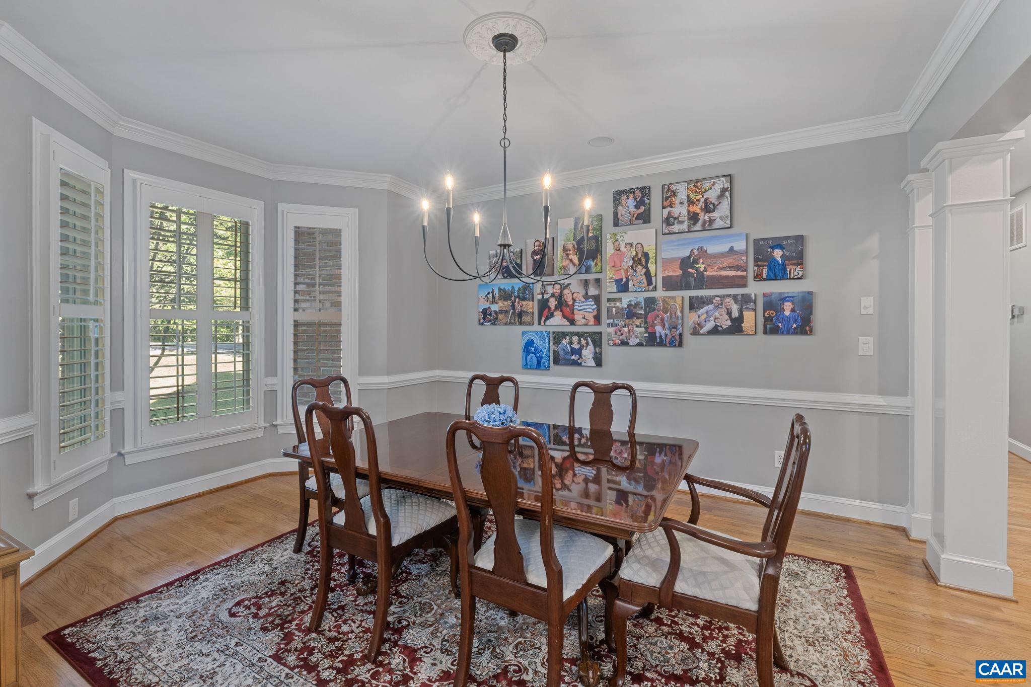 2370 Walnut Ridge Lane Charlottesville, VA 22911 - Photo 19 of 61 a view of a dining room with furniture window and wooden floor