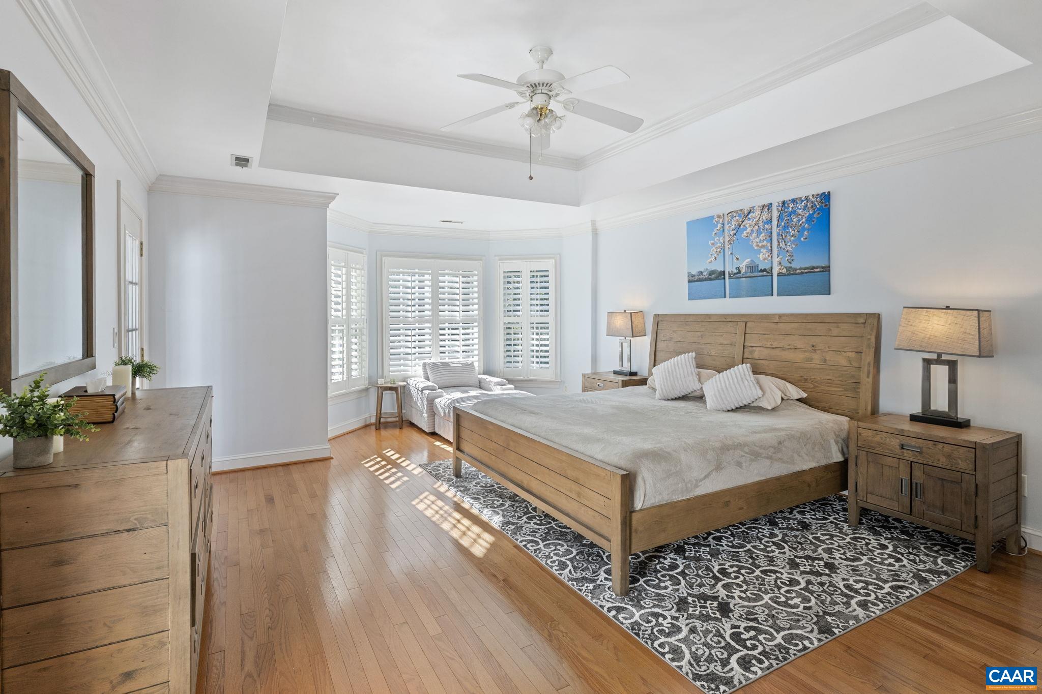 2370 Walnut Ridge Lane Charlottesville, VA 22911 - Photo 23 of 61 a bedroom with a bed and a dresser