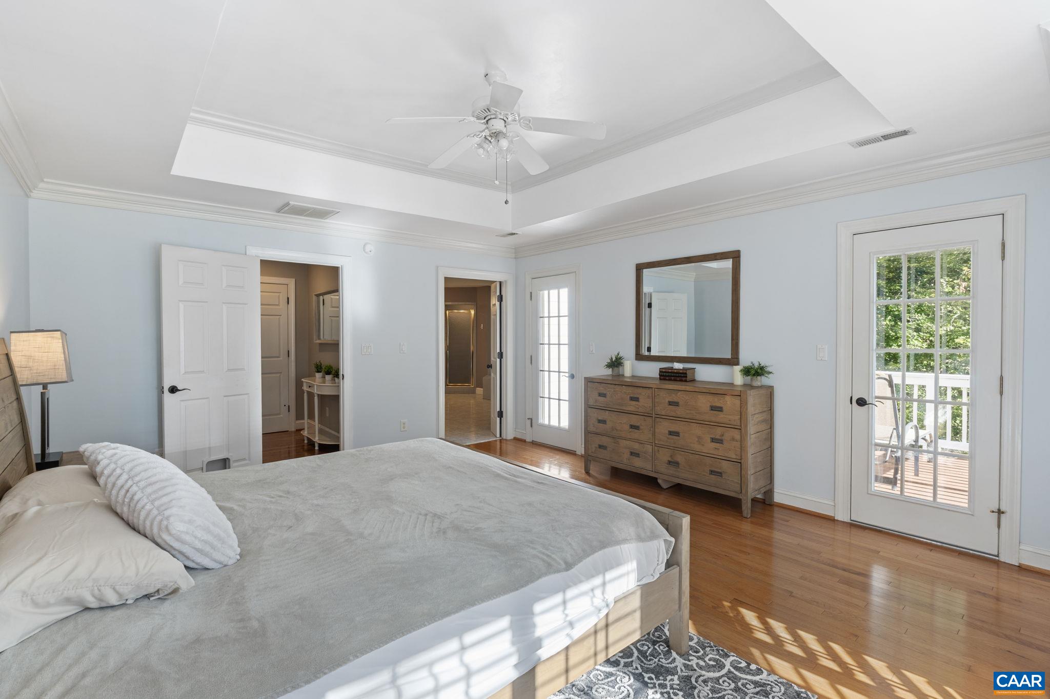 2370 Walnut Ridge Lane Charlottesville, VA 22911 - Photo 24 of 61 a bedroom with a bed and a dresser