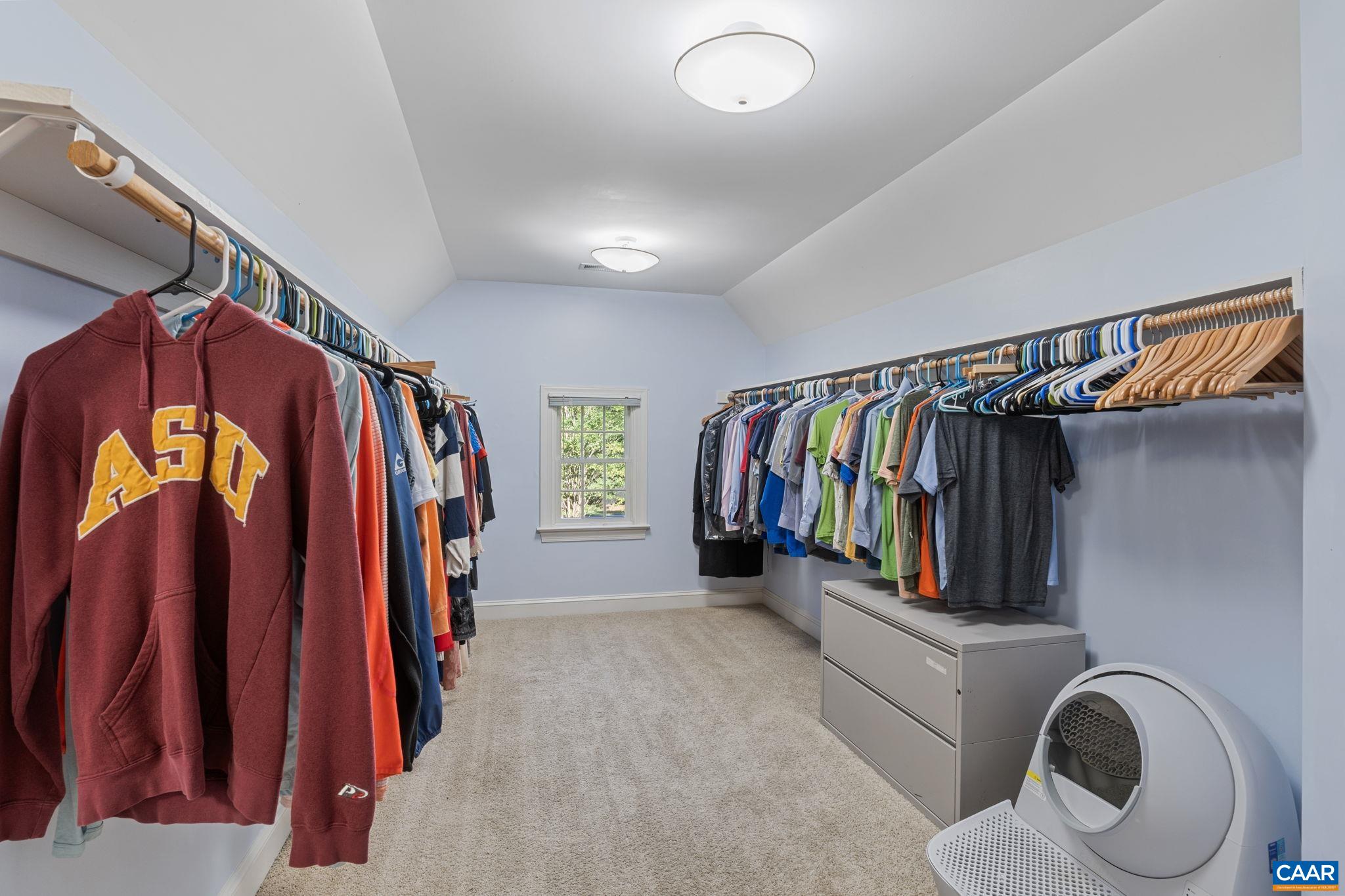 2370 Walnut Ridge Lane Charlottesville, VA 22911 - Photo 29 of 61 a view of walk in closet with clothes and shoes