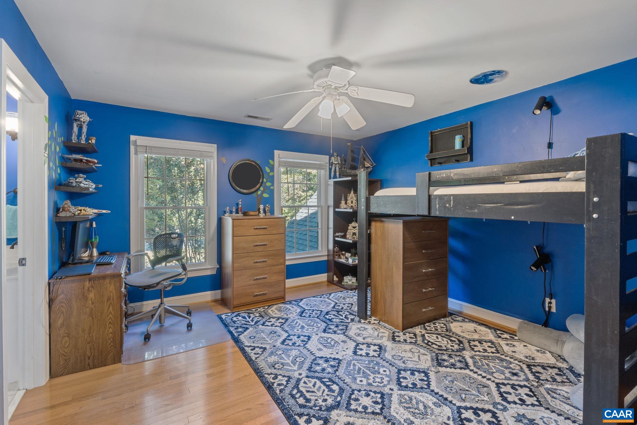 2370 Walnut Ridge Lane Charlottesville, VA 22911 - Photo 30 of 61 a living room with furniture and a fireplace