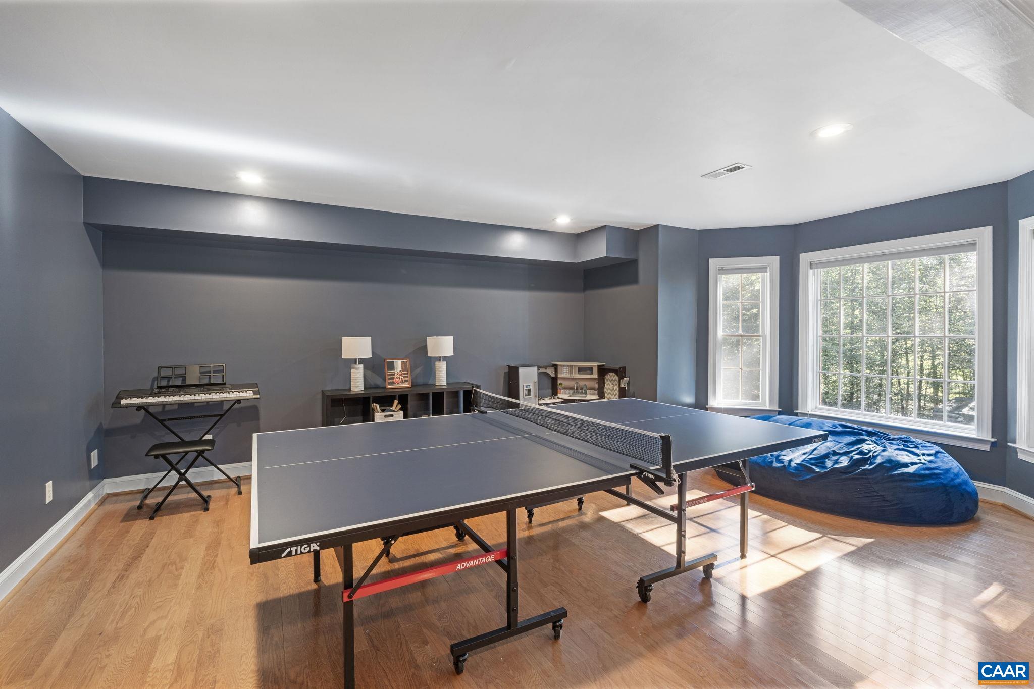 2370 Walnut Ridge Lane Charlottesville, VA 22911 - Photo 37 of 61 a workspace with furniture hardwood and a window
