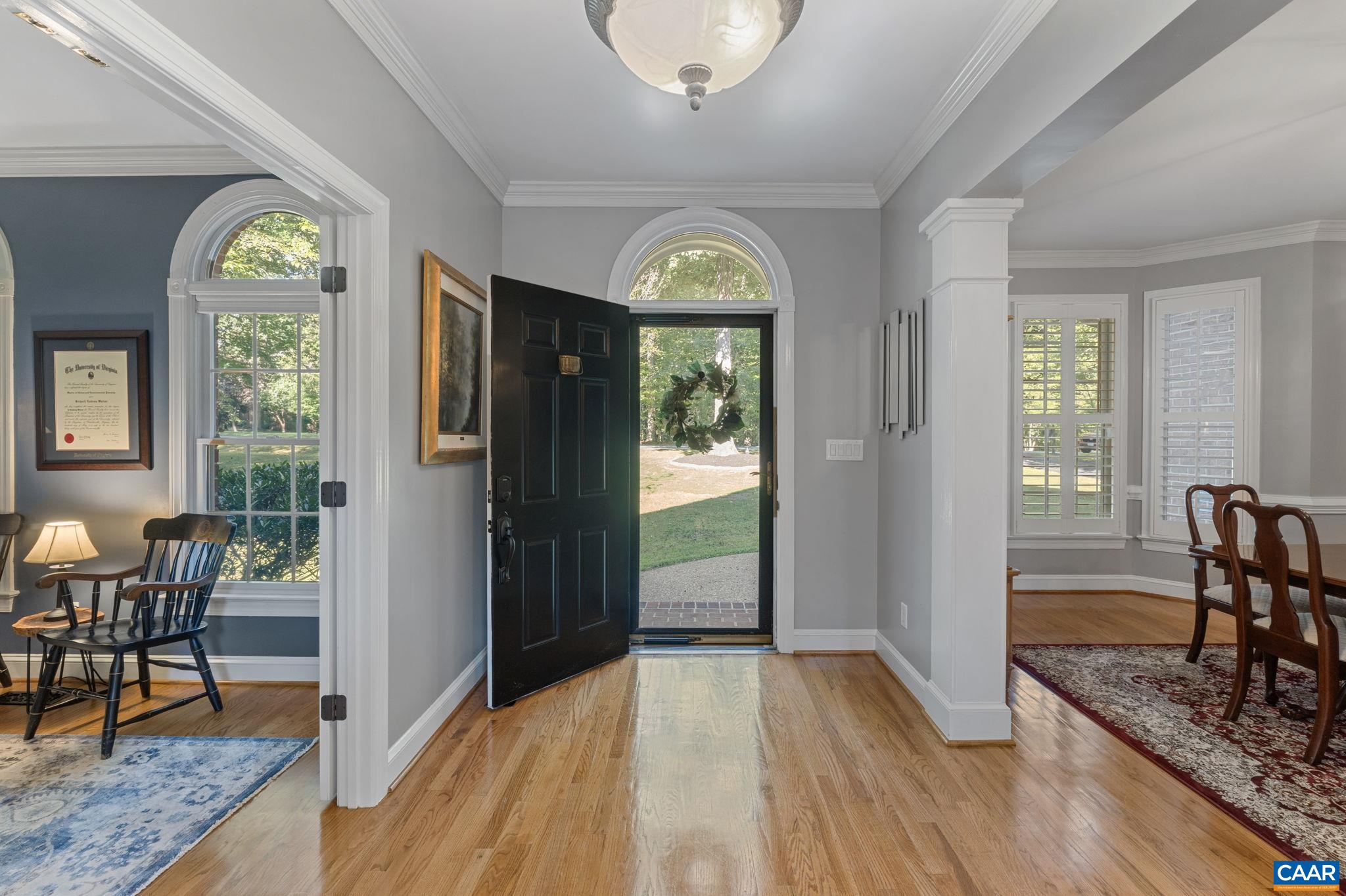 2370 Walnut Ridge Lane Charlottesville, VA 22911 - Photo 4 of 61 a view of a livingroom with furniture wooden floor and windows