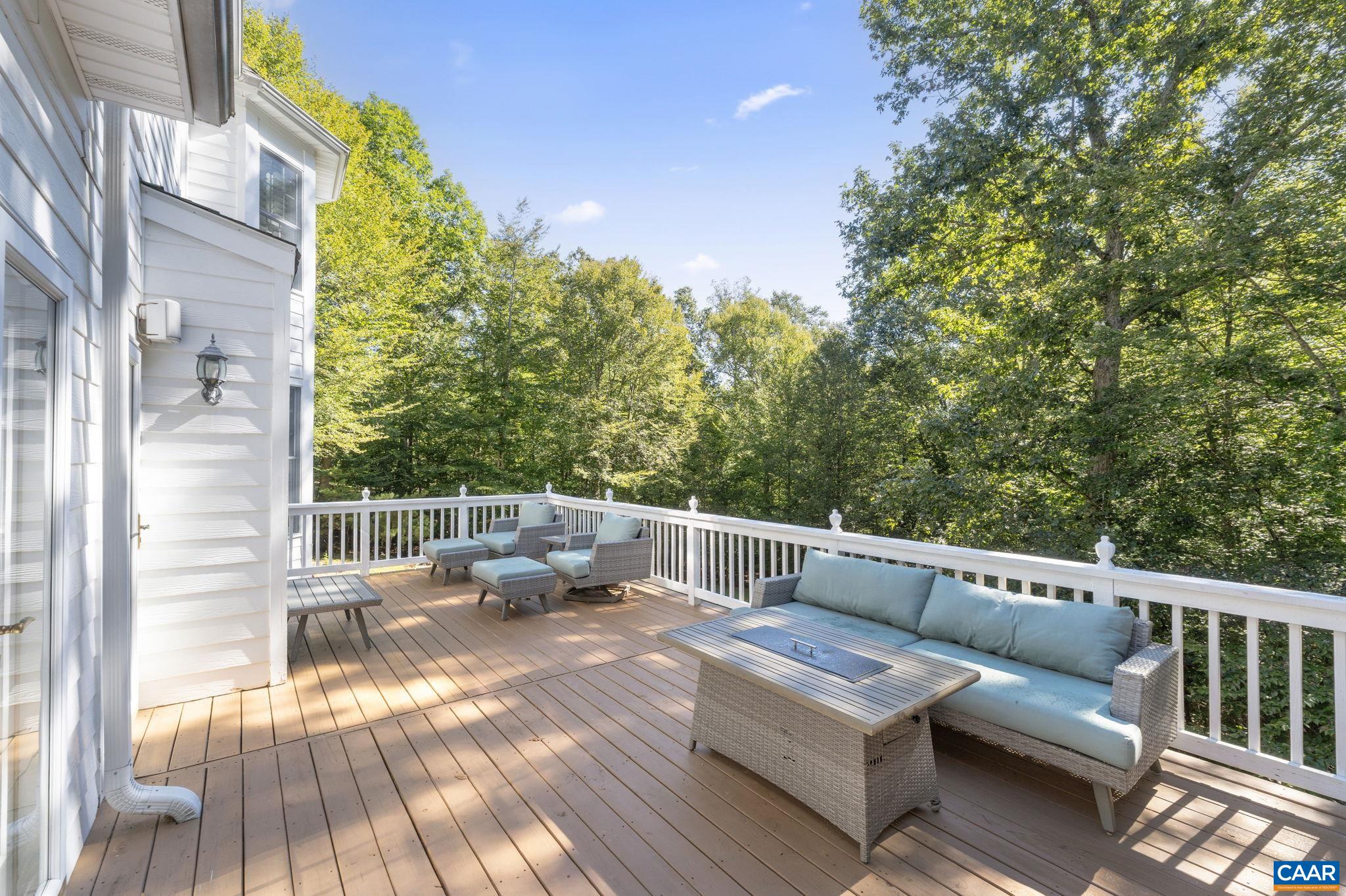 2370 Walnut Ridge Lane Charlottesville, VA 22911 - Photo 44 of 61 a view of roof deck with couches and wooden floor