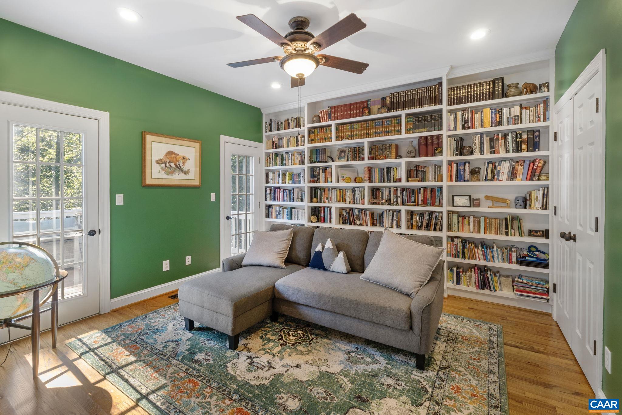 2370 Walnut Ridge Lane Charlottesville, VA 22911 - Photo 9 of 61 a living room with furniture and a rug