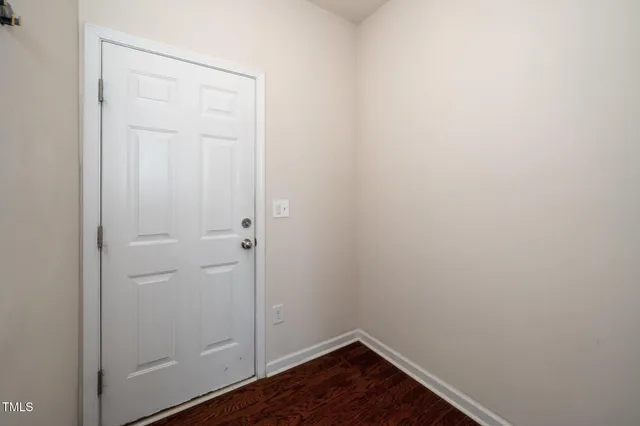 a view of small space with wooden floor