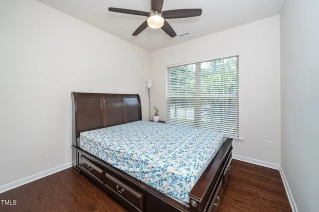 an outdoor space with wooden floor