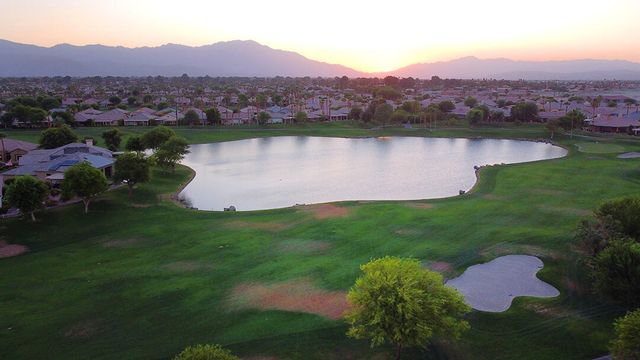a view of a lake with a mountain in the background