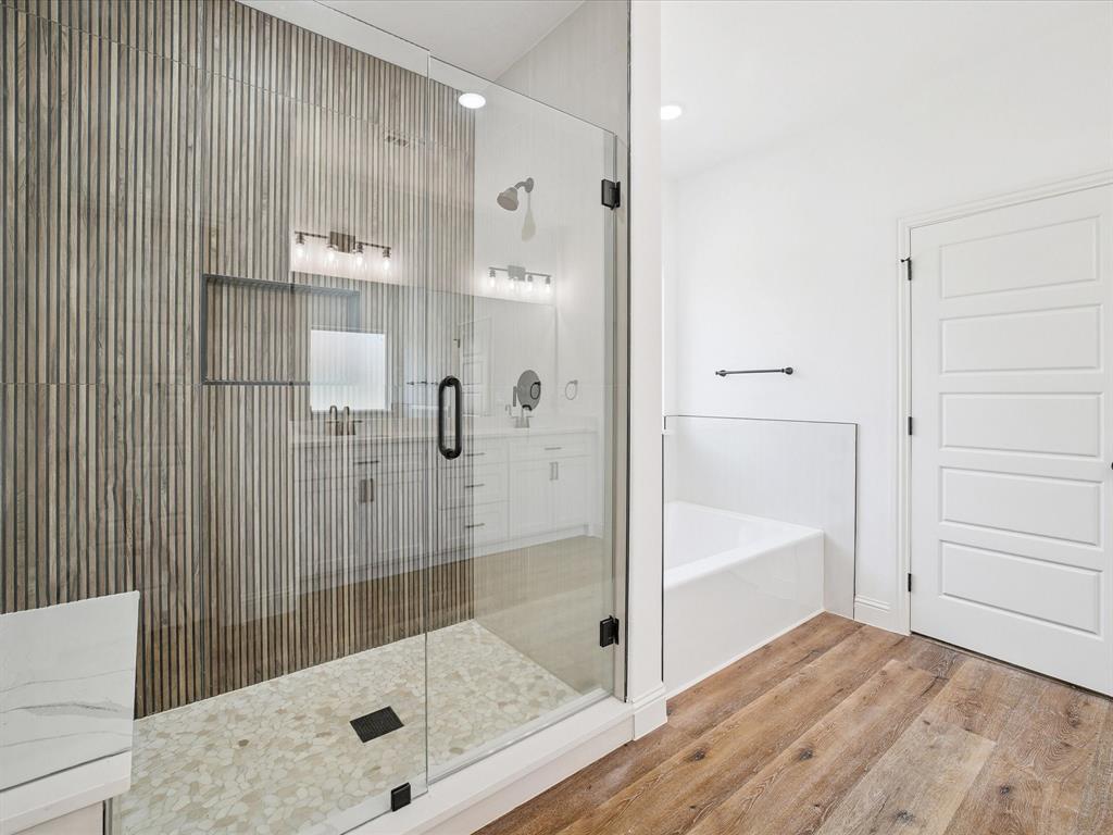 448 Rs County Road Alba, TX 75410 - Photo 26 of 34 a bathroom with a bathtub and a shower