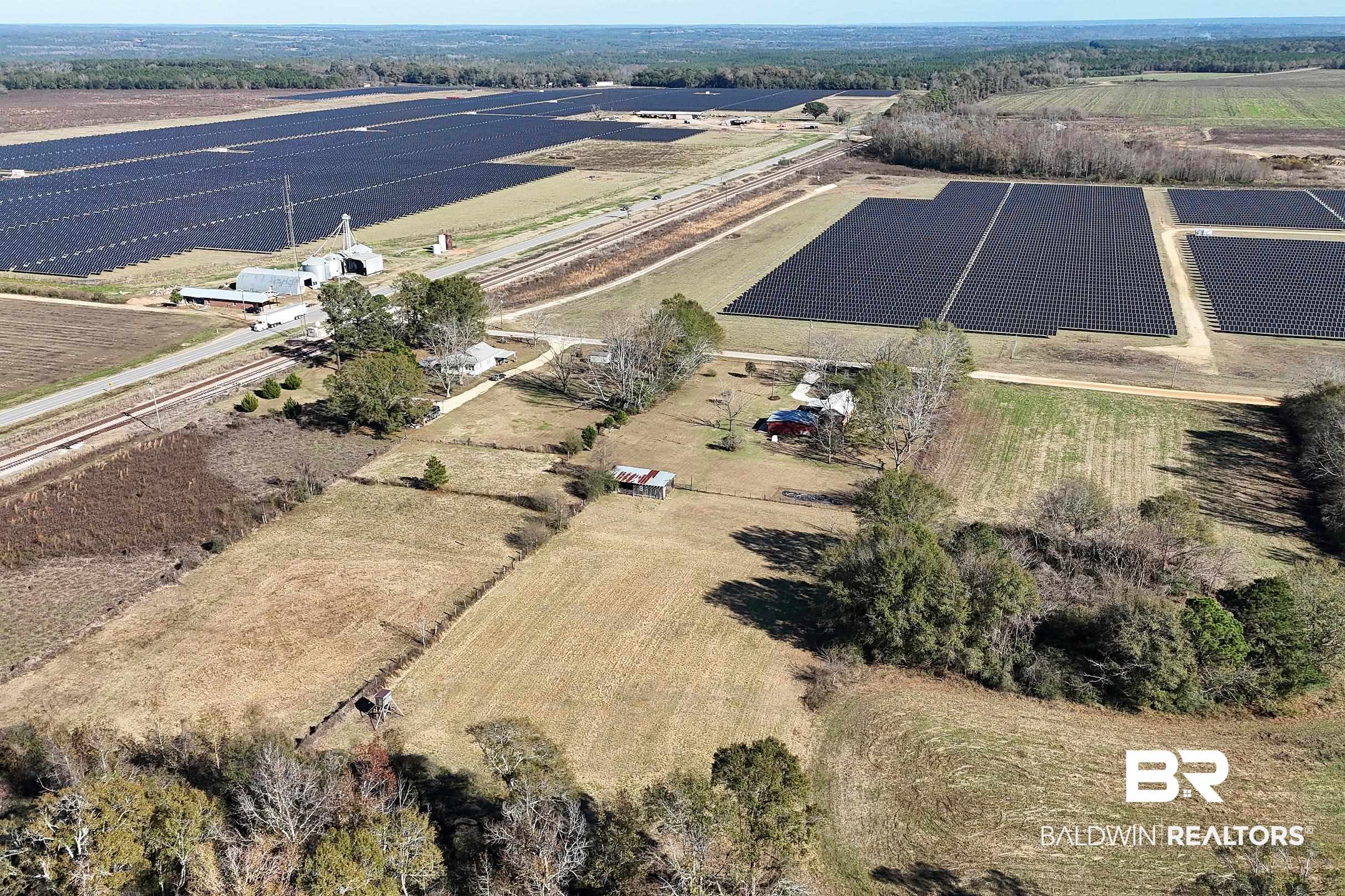 110 Sam Jones Road Atmore, AL 36502 - Photo 36 of 47 Aerial overview of property's location featuring rural landscape