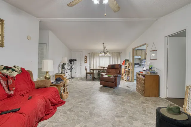 a living room with furniture and a couch