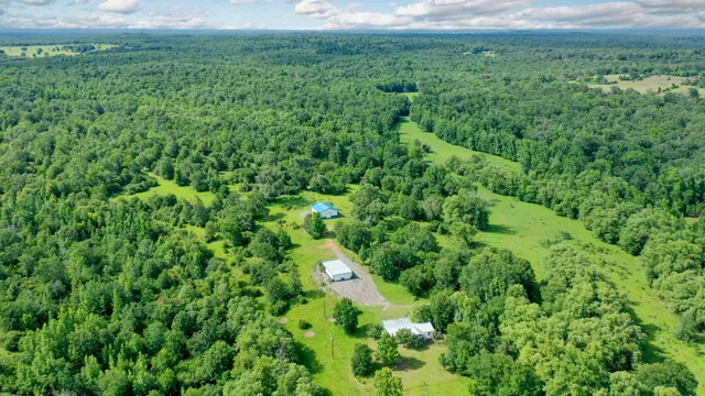 a view of a lake with a yard