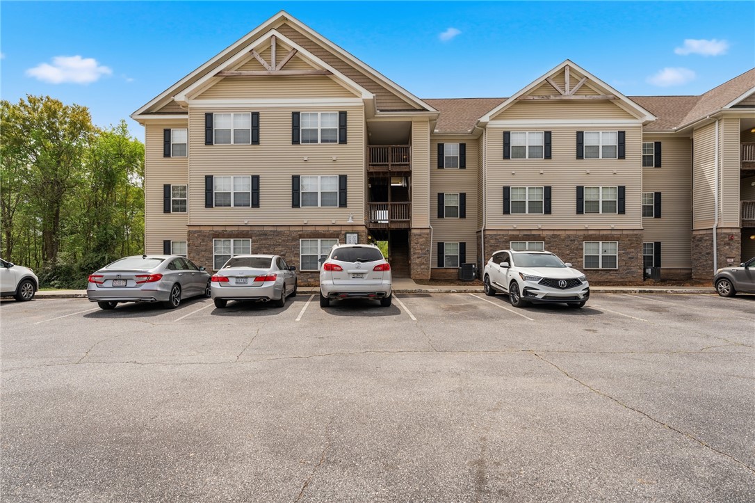 102 Lookover Drive Anderson, SC 29621 - Photo 1 of 27 The multi-level residence features appealing siding and stone accents with ample parking space. This unit is 1 flight down with walkout private patio.