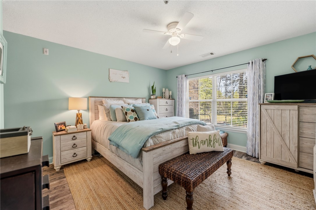 102 Lookover Drive Anderson, SC 29621 - Photo 12 of 27 The primary bedroom offers comfort, space and a connection to the outdoors through its bright window.