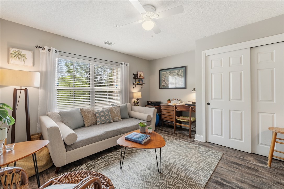 102 Lookover Drive Anderson, SC 29621 - Photo 15 of 27 This inviting living space features warm flooring, abundant natural light, and convenient closet access.