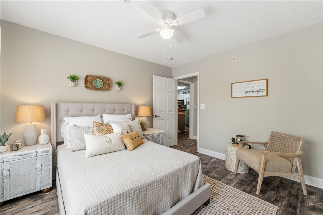 102 Lookover Drive Anderson, SC 29621 - Photo 19 of 27 This inviting bedroom features LVP flooring, a ceiling fan, and easy access to the adjacent kitchen.
