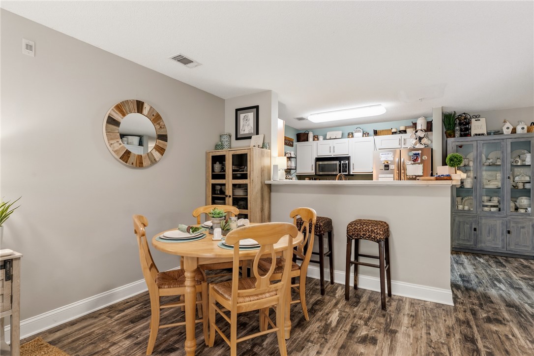 102 Lookover Drive Anderson, SC 29621 - Photo 7 of 27 This inviting dining area seamlessly connects to the kitchen, perfect for everyday living and entertaining.