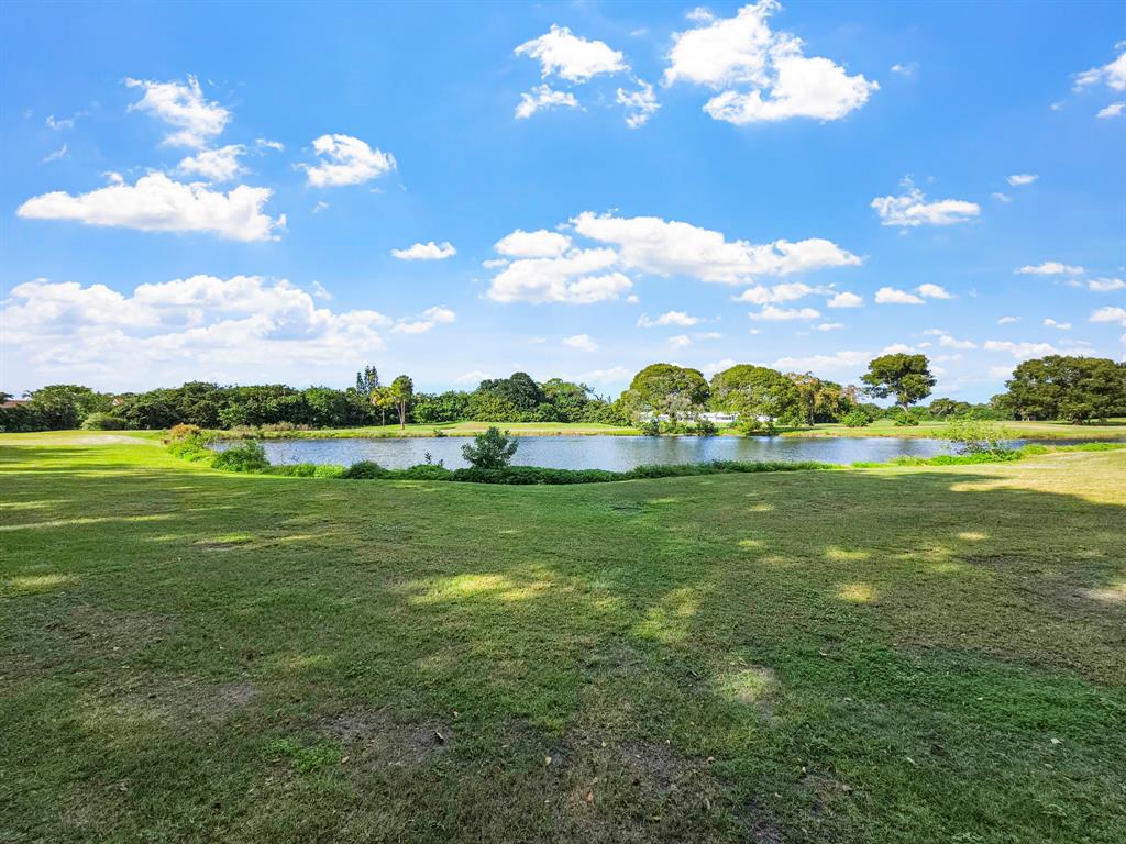 9286 Vista Del Lago, Unit 35B Boca Raton, FL 33428 - Photo 17 of 17 a view of a golf course with a big yard
