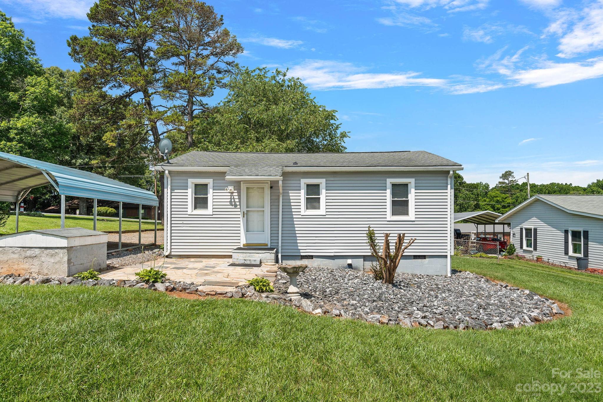 825 Reynolds Road Statesville, NC 28677 - Photo 17 of 26 a house that has a lot of plants in it
