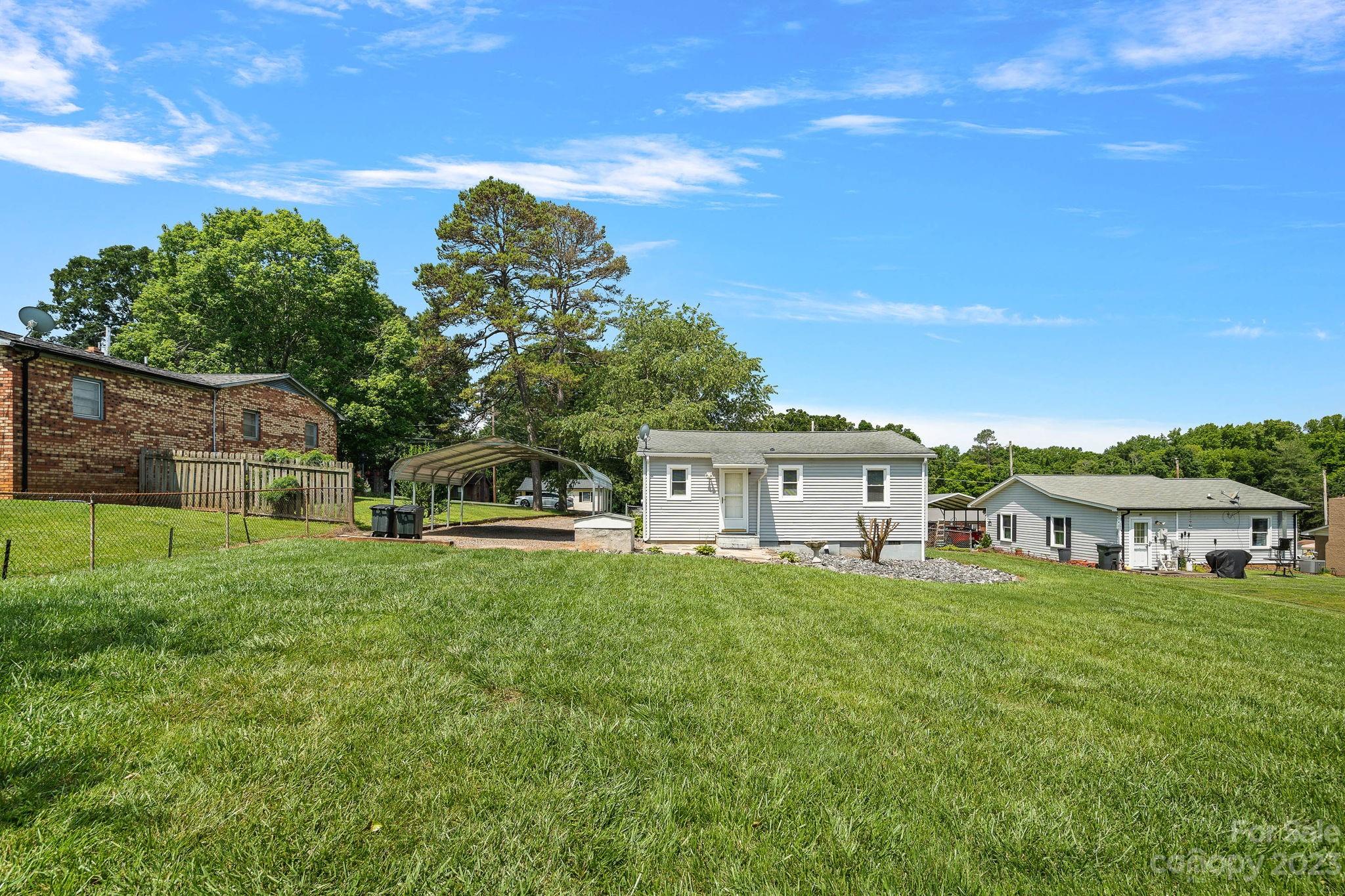 825 Reynolds Road Statesville, NC 28677 - Photo 21 of 26 a house view with a garden space