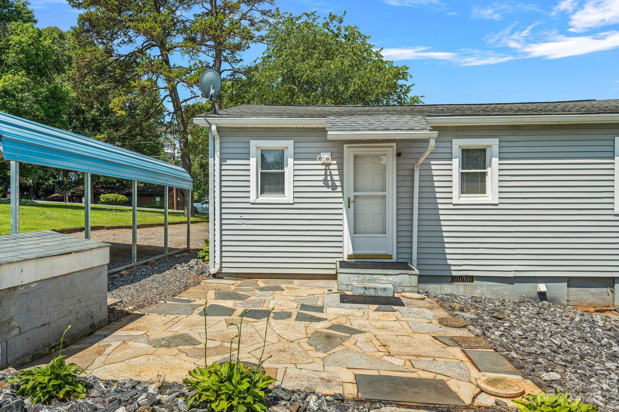 825 Reynolds Road Statesville, NC 28677 - Photo 24 of 26 a view of a house with a yard