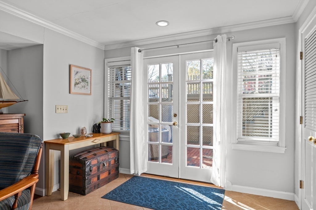 27 R West Street, Unit 4 Beverly, MA 01915 - Photo 18 of 27 a view of an empty room with furniture and a window