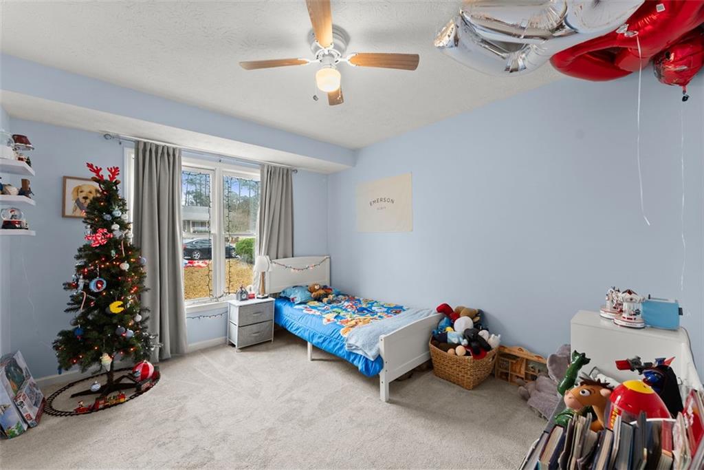 2980 Phillips Bend Crossing Northeast Buford, GA 30519 - Photo 25 of 45 a children room with toys and toys