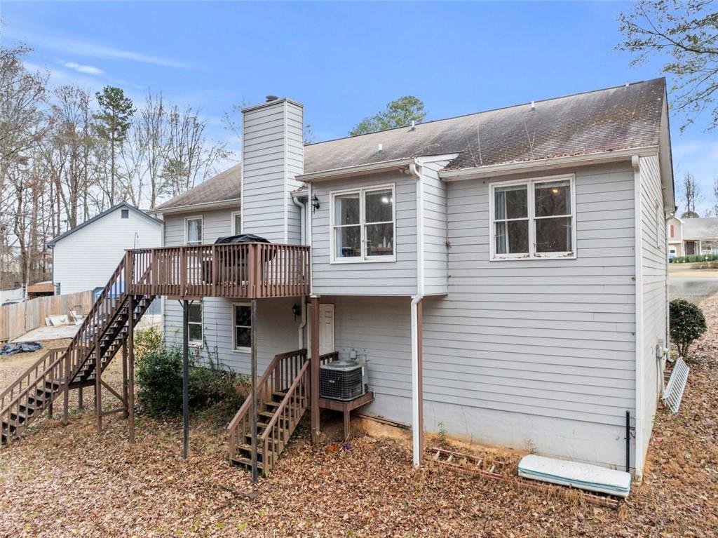 2980 Phillips Bend Crossing Northeast Buford, GA 30519 - Photo 38 of 45 a front view of a house with a yard