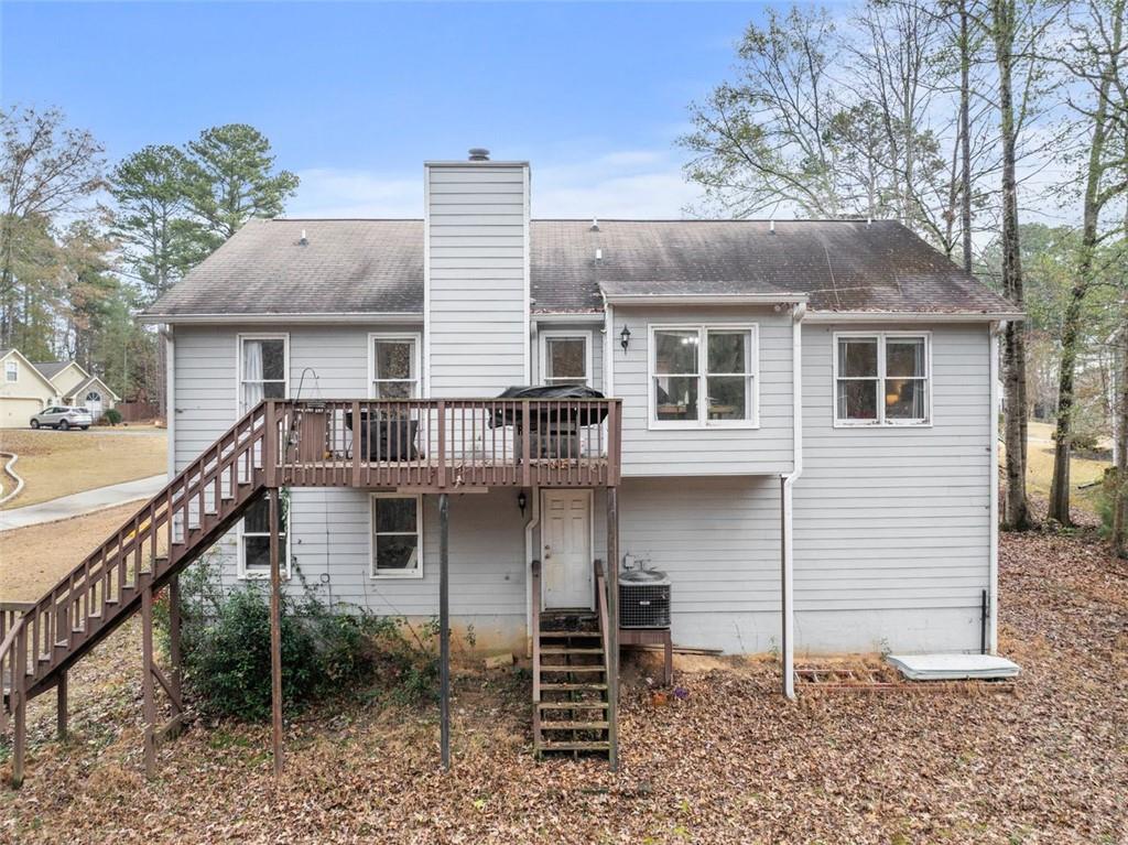 2980 Phillips Bend Crossing Northeast Buford, GA 30519 - Photo 39 of 45 a front view of a house with plants