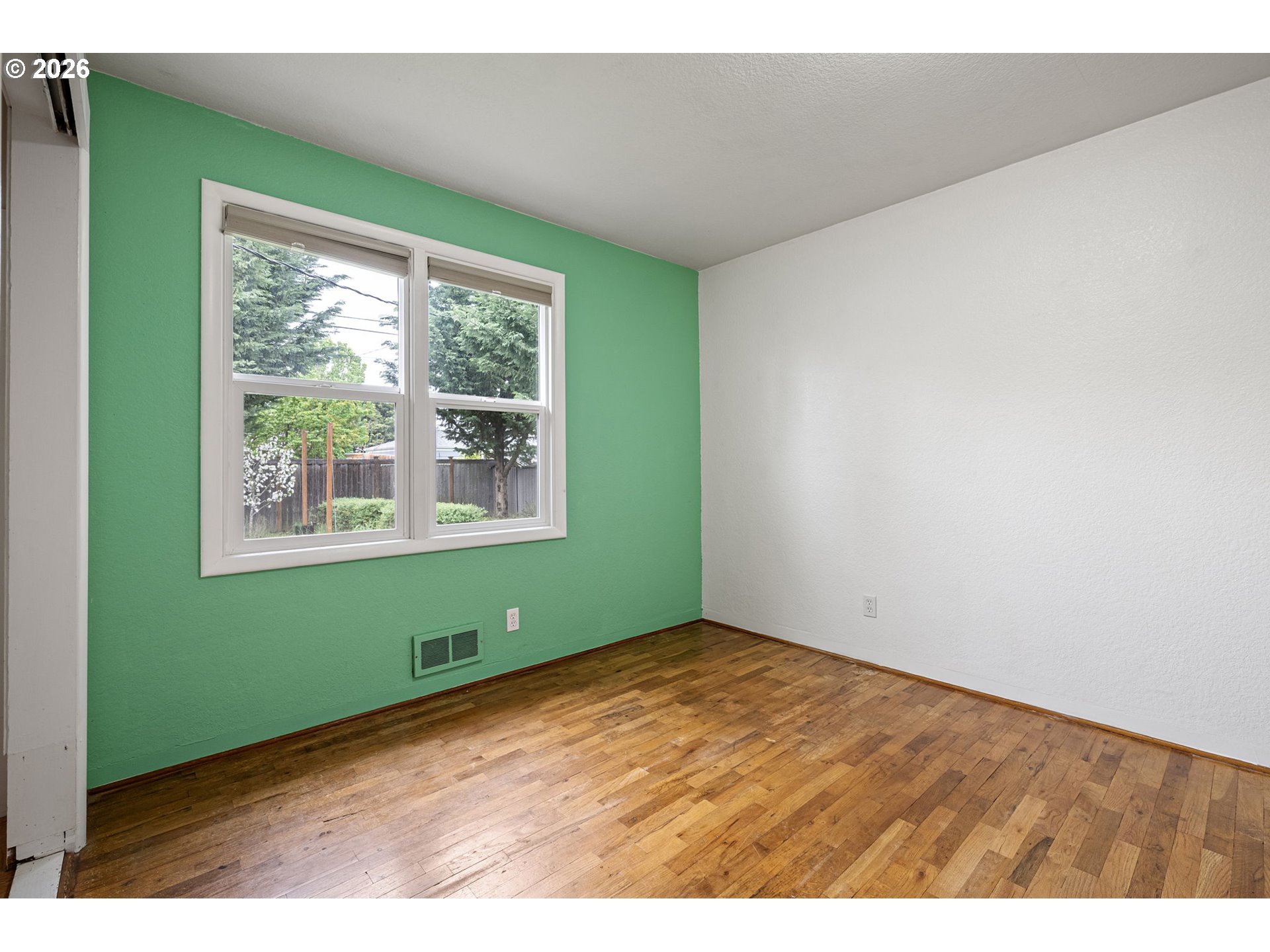 1565 Linwood Street Eugene, OR 97404 - Photo 22 of 42 a view of an empty room with a window