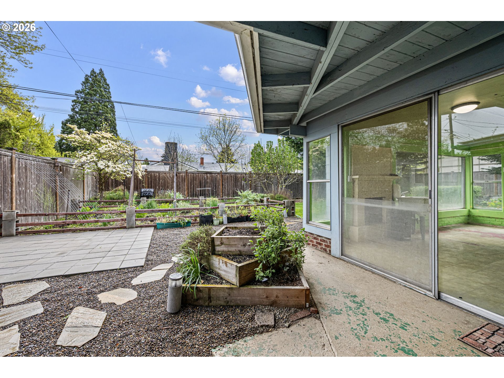 1565 Linwood Street Eugene, OR 97404 - Photo 27 of 42 a view of a porch with furniture and garden