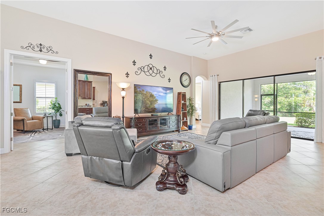 17283 Walnut Run Drive Alva, FL 33920 - Photo 12 of 49 a living room with furniture and a large window