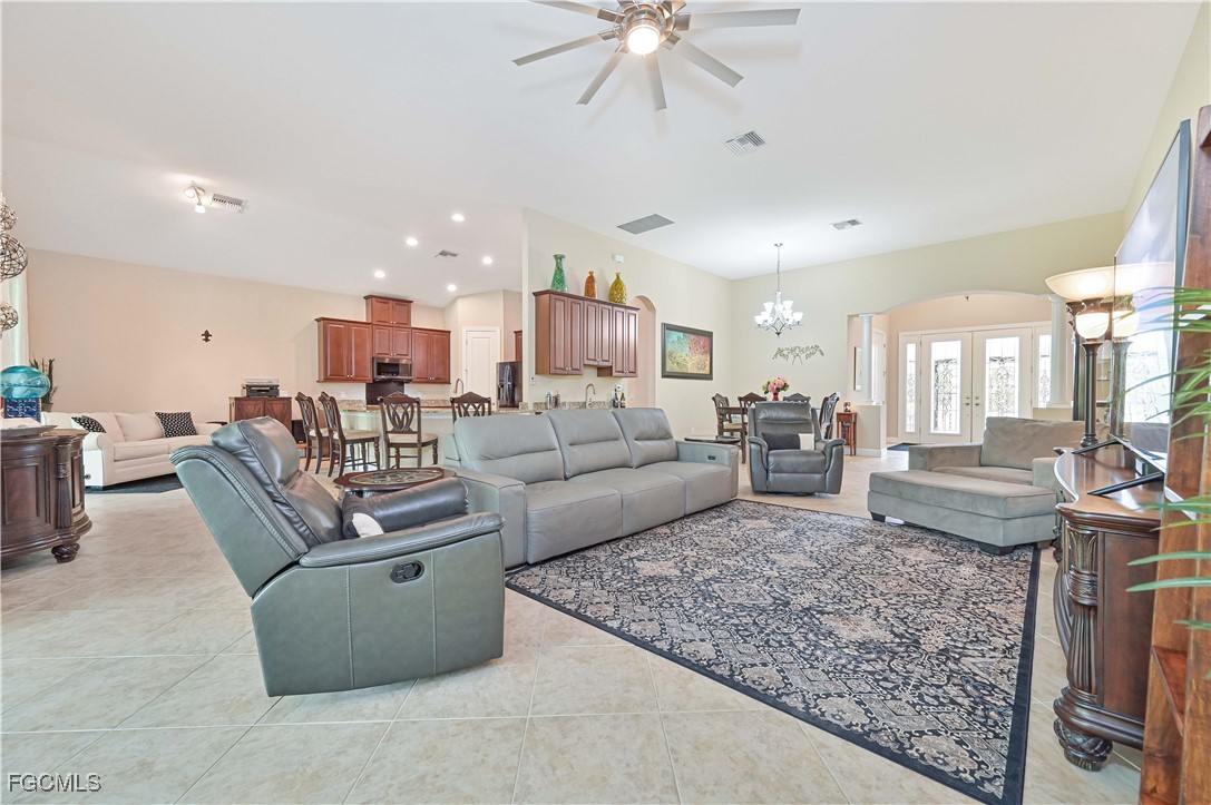 17283 Walnut Run Drive Alva, FL 33920 - Photo 14 of 49 a living room with furniture and a table