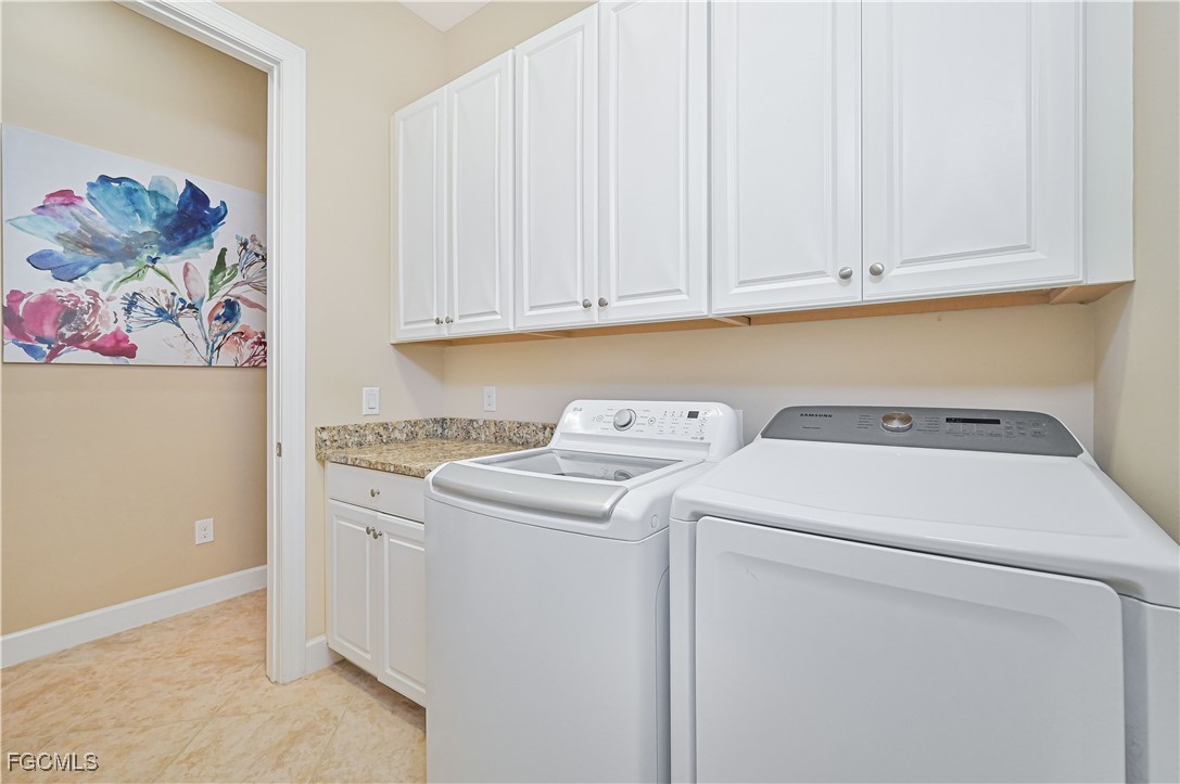 17283 Walnut Run Drive Alva, FL 33920 - Photo 25 of 49 a utility room with dryer and washer