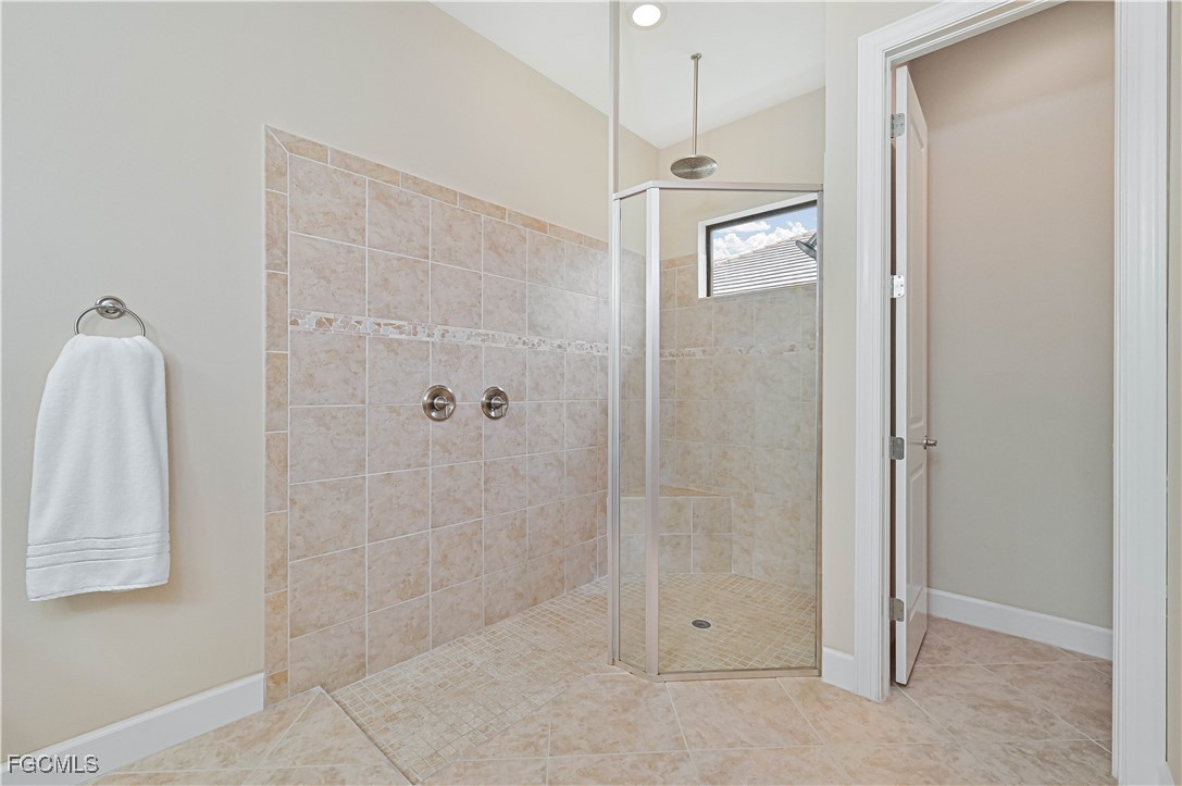 17283 Walnut Run Drive Alva, FL 33920 - Photo 31 of 49 a bathroom with a shower and a sink