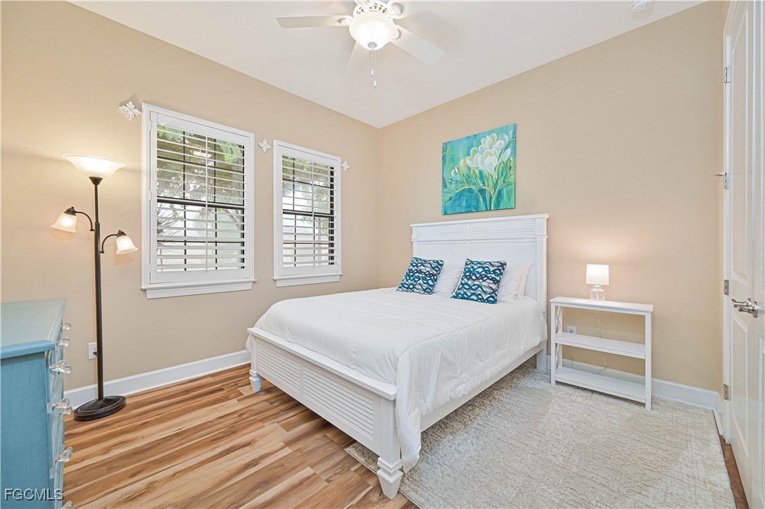 17283 Walnut Run Drive Alva, FL 33920 - Photo 36 of 49 a bedroom with a bed and a window