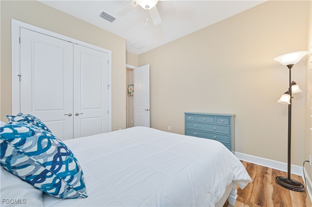 17283 Walnut Run Drive Alva, FL 33920 - Photo 37 of 49 a bedroom with a bed and a dresser