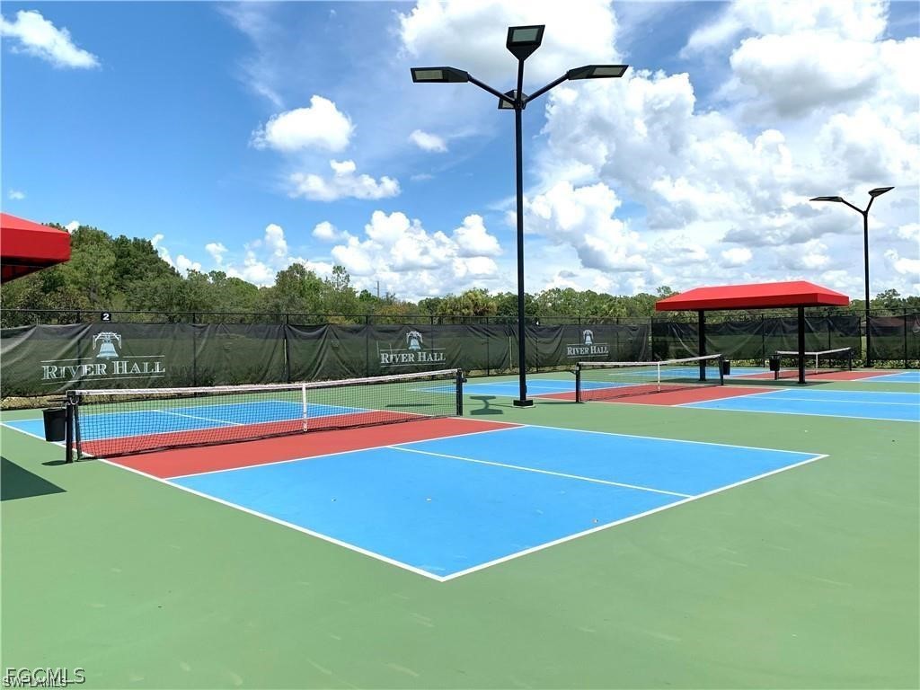 17283 Walnut Run Drive Alva, FL 33920 - Photo 46 of 49 a view of outdoor space and basketball court