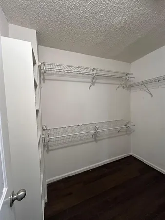 a view of a room with racks on the wall