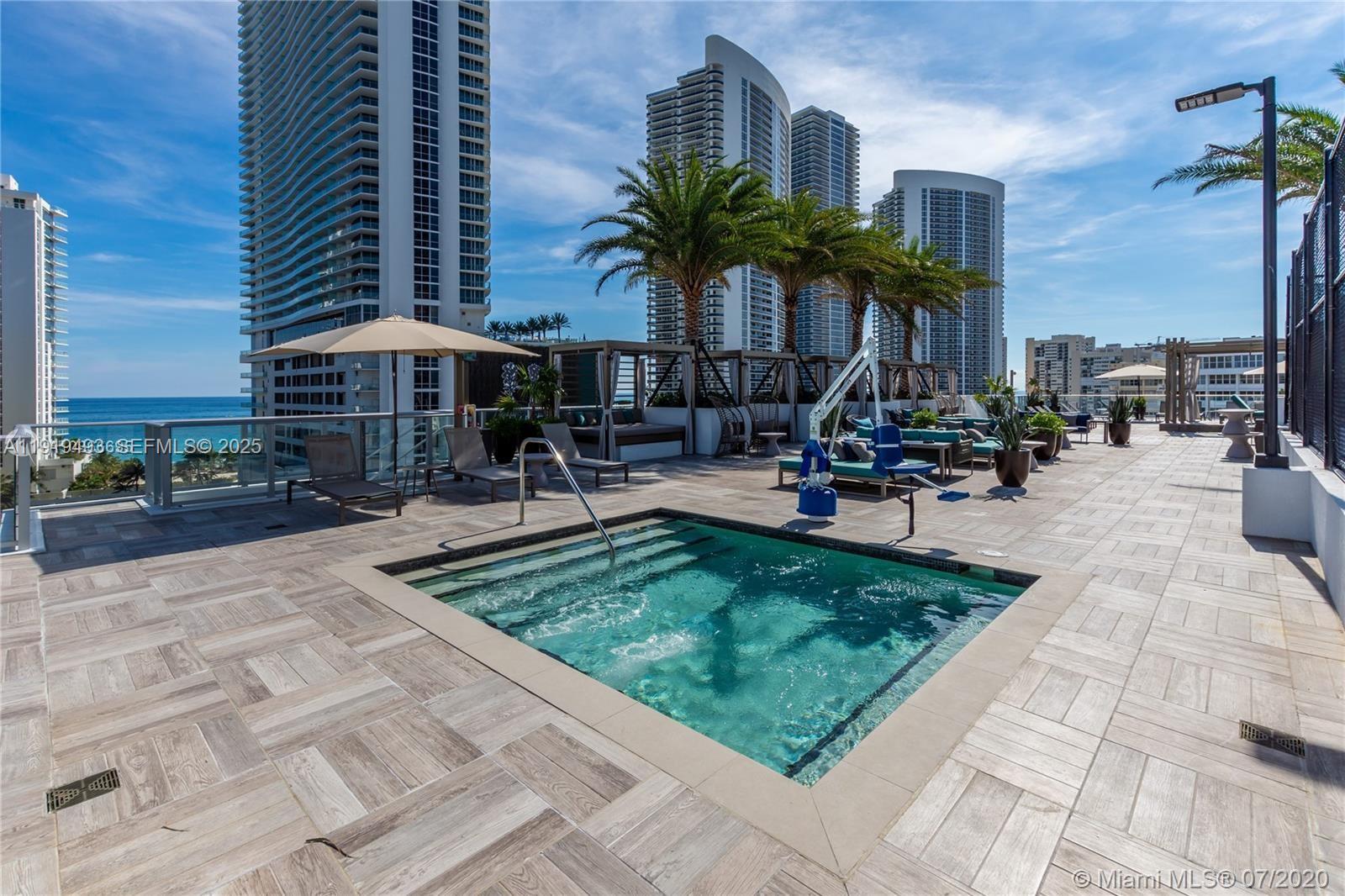 4010 South Ocean Drive, Unit R2904 Hollywood, FL 33019 - Photo 28 of 32 a view of a building with sitting area and furniture