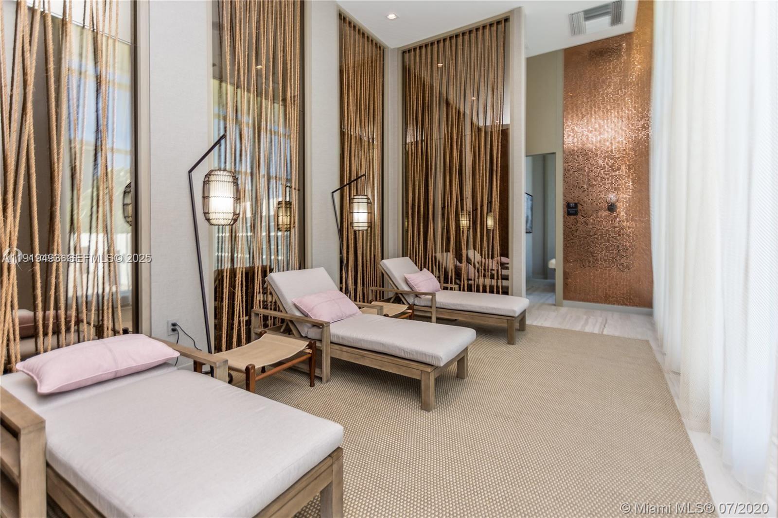 4010 South Ocean Drive, Unit R2904 Hollywood, FL 33019 - Photo 31 of 32 a living room with furniture and a large window