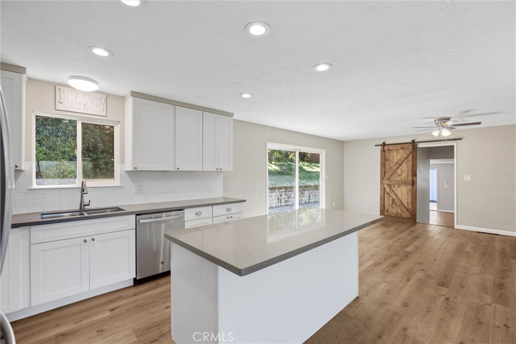 904 Long Bar Road Oroville, CA 95966 - Photo 21 of 50 a kitchen with a sink stove and cabinets