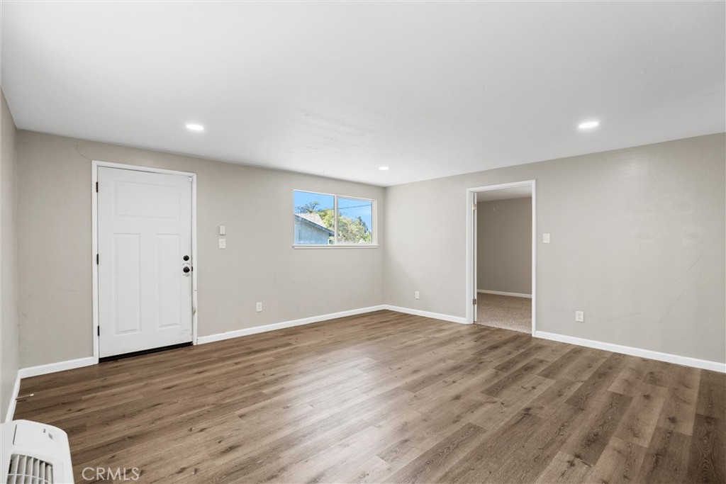 904 Long Bar Road Oroville, CA 95966 - Photo 29 of 50 a view of an empty room with wooden floor and closet