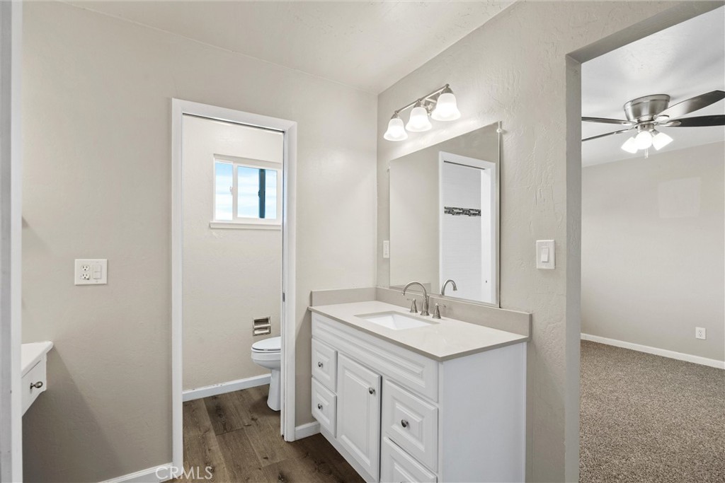 904 Long Bar Road Oroville, CA 95966 - Photo 30 of 50 a bathroom with a double vanity sink and a mirror
