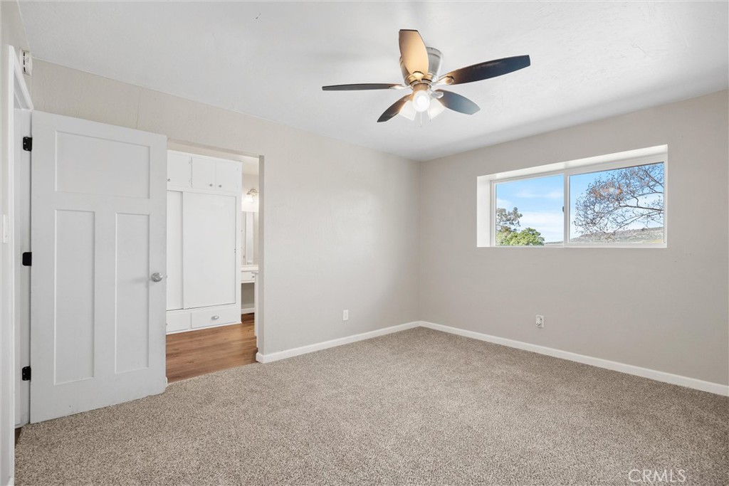 904 Long Bar Road Oroville, CA 95966 - Photo 32 of 50 a view of a livingroom with a ceiling fan & windows